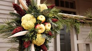 This wreath is filled to the brim with fruit but also has some natural elements like seed pods, pine cones and grapevine. Colonial Christmas At Williamsburg The James River Plantations