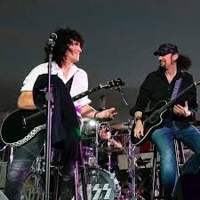 Happy Birthday to KISS guitarist Tommy Thayer. (Photos from two different  KISS Kruises… don't we miss them!)