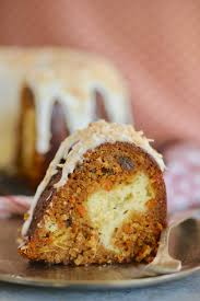 This cake is the winner of the kitchen carrot cake smackdown! Carrot Bundt Cake Recipe With Cheesecake Filling