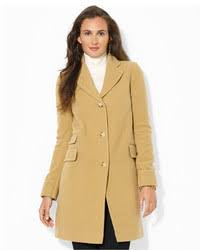 A single breated overcoat / peacoat with two pockets. Wardrobe Staple Camel Coat Lookastic