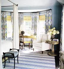 Charming yellow an blue cottage bedroom features a yellow upholstered bed accented with green trellis bedding topped with floral pillows. Blue Yellow Gray Bedroom Cottage Bedroom