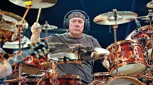 You know it's coming but there's nothing you can do about it. Neil Peart Marching To The Beat Of A Different Drum Louder