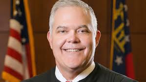 Judge Padgett receiving award for judicial history book