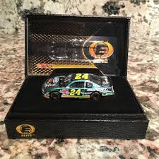 Jeff gordon rainbow warrior #5daysoflionel. Jeff Gordon No 24 Dupont Looney Tunes 2001 Monte Carlo Elite 1 64 Die Cast Car Jeff Gordon Nascar Diecast Monte Carlo
