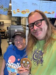 Half-smiling grandson at rezinorr class reunion