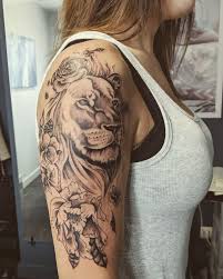 33 majestic and powerful lion tattoo designs. Lion Tattoo With Flowers Lion Tattoo With Flowers Tattoos Cool Tattoos