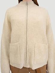 Shopbop offers assortments from over 400 clothing, shoe, and accessory designers. Holzweiler Penguin Knit Beige Promotions