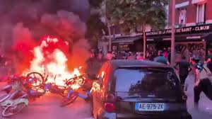 Paris in Chaos: Football Fans Riot After France’s World Cup Exit