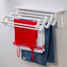 Remember those old accordion coat racks you used to see at your grandma's house? Space Saving Compact Wall Mounted Indoor Expandable Accordion Style Clothes Dryer Folding Laundry H Clothes Drying Racks Wall Mounted Clothes Dryer Drying Rack