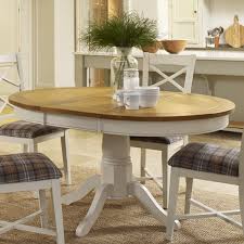 Hudson round white extending dining table with 4 bewley slate fabric chairs. Oak Dining Table Oak Extending Dining Table Curiosity Interiors