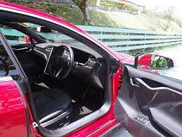 今次的長測主角tesla model s 是現時最普及的純電動車 所以就算你不懂他的名字 亦會發現經常跟你擦身而過 tesla car door steering wheel