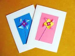 Fold the top corner of the kimono over to form a v shape, as shown in the image. Greeting Cards Using An Easy Origami Windmill Youtube