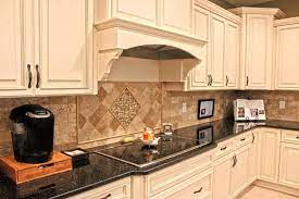 Looking for the latest trends in kitchen design? Fabuwood Cabinetry Wellington Ivory Finish Wellington Spice Two Tone Kitchen Cabinet Kitchen Cabinets Decor Beautiful Kitchen Cabinets Red Kitchen Cabinets