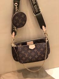 It's easy to pack and wear for any occasion. Louis Vuitton Monogram Multi Pochette Accessoires Coin Purse M44813 Khaki Louis Vuitton Louis Vuitton Monogram Designer Handbags Louis Vuitton