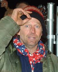 John Quigley goes back to his roots and climbs 'Old Glory' for 20-year  relocation anniversary