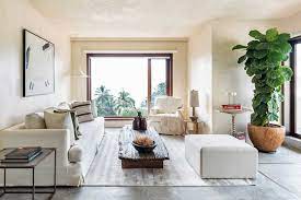 This 6,000 square foot home in mumbai is seamlessly connected to another house, while its interiors are photo caption: A Seaside Apartment Inspired By Wabi Sabi Design Anthology