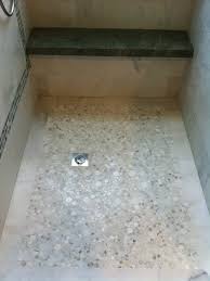 Zen bathroom features open shower clad in stone surround as well. Pin By Jennifer Santa Anna On Bathrooms Pebble Shower Floor Shower Floor Marble Showers