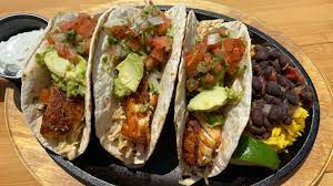 Combine fish marinade ingredients in a ziplock bag. Happy Hour Fish Tacos Stock Rock Cafe