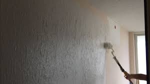 How To Skim Coat Walls Using The Paint Roller Trick Textured Walls Paint Roller Painting Over Wallpaper