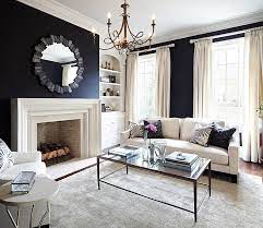 In the case of living rooms with white walls, a visually pleasing way to contrast or complement those walls is to choose a vibrant or warm curtain colour. Black And White Living Rooms Design Ideas