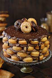 13 Over The Top Desserts Starring Donuts Desserts Doughnut Cake Dessert Recipes