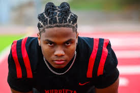 Signing Day: Cajon's JeyQuan Smith and Centennial's Izzy Carter sign with  South Florida football