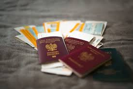 Passport and travel documents on a desk