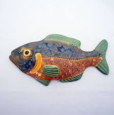 In the final stage the ceramic item is hand painted using. Pin By Irena On Ceramics Pottery Tiles Yewellery Decor Ceramic Fish Clay Fish Fish Sculpture