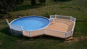 White picket fence designs are considered to be a charming addition to the classic american home. Above Ground Pool Deck Kits Wood Youtube