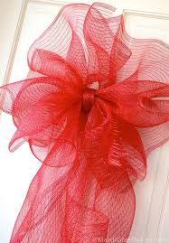 Making A Large Bow With Deco Mesh Christmas Bows Diy Deco Mesh Bows Deco Mesh Crafts