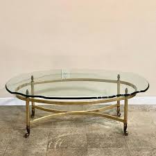 Simply browse an extensive selection of the best glass coffee table and filter by best match or price to find one that suits you! Sasha Round Brass Coffee Table With Oval Glass Top Chloe S Vintage