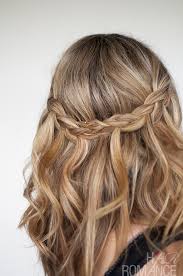 We love the way they're styled here with two buns in the front and hanging braids in the back. Waterfall Plait Hairstyle Tutorial Hair Romance