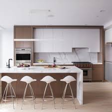 There is no decorating guideline that states all of your semi customized cabinets have to be the same color. 75 Beautiful White Kitchen With Brown Cabinets Pictures Ideas July 2021 Houzz