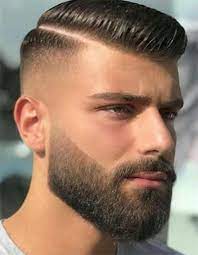 Faux Hawk Fade With Part And Beard Fohawk Haircuts Beard Styles Haircuts Best Beard Styles Beard Haircut