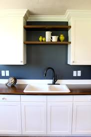 white cabinets and blue walls