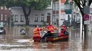 A car stands in a flooded street on july 14, 2021 in hagen, western germany, after heavy rain hit parts of the country, causing widespread flooding. Zuot4oky5lx4xm