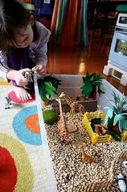 Create a fun zoo sensory bin for toddler and preschool zoo theme sensory play. Pink And Green Mama Sensory Box Zoo Box Sensory Boxes Sensory Kids Sensory