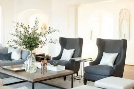 Gray Linen Wingback Chairs And Nesting End Tables Transitional Living Room Transitional Living Rooms Wingback Chair Living Room Home Living Room