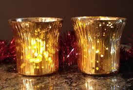 Classic clear glass votive candle holders are the go to item for event planners who need a lot of candle holders quickly and within a tight budge. Antique Finish Tea Light Votive Candle Holders Gold Set Of 4 Mystiquedecors By Ak