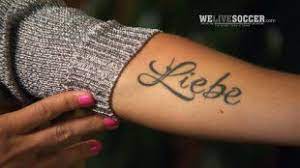 Krieger has a gorgeous and intricate tattoo running along the side of her body. For Uswnt S Ali Krieger Love Conquers All And Hopefully Top Ranked Germany Tattoos Love Tattoos Love Conquers All