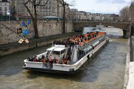 Paikbot Watches A Bateau Mouche Go By On The Seine Bateau His Travel Boat