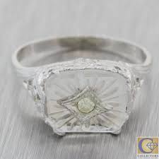 Vintage camphor glass jewelry is quite distinctive, with its square, rectangular or oval shaped glass, typically framed with silver filigree metal (either pot metal, white gold, platinum or sterling), and featuring a single marcasite gem at the center. 1940s Antique Art Deco Estate 14k White Filigree Camphor Glass Diamond Collectors1946 Com