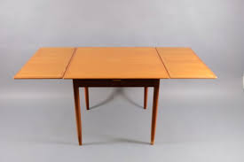 Round and extending tables are our speciality and the perfect practical solution to maximise your space and meet the demands of family life. Mid Century Square Teak Extendable Dining Table For Sale At Pamono