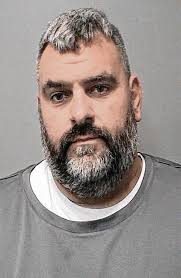 Indy man charged after pointing gun at Whiteland high school students