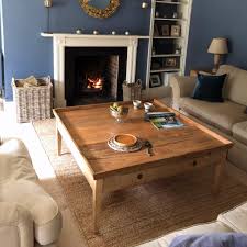 This could be as simple as a shelf that sits below the table top, effectively doubling the surface area. Empire Coffee Table Two Sizes Em3 Wr Em3 W Scumble Goosie