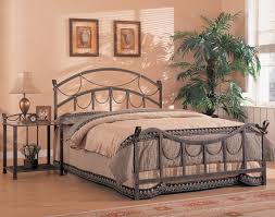 Wrought iron beds have a persona all they're own. Wrought Iron Bedroom Furniture Gallery Ideas Teak Ashley With Heavy Beds Sets Decorating Bedrooms White Ornate Apppie Org
