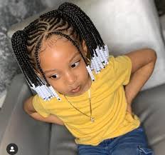 A traditional black kids style celebrating a rich culture. World Most Liked Kids Braid Hairstyles Artificial Hair Integrations Box Braids Hairstyles Kids Box Braids Box Braids Hairstyle Long Hair
