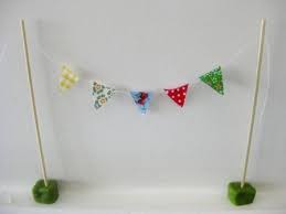 Remove your cards (make sure they're in the order you wanted them). Fabric Cake Bunting