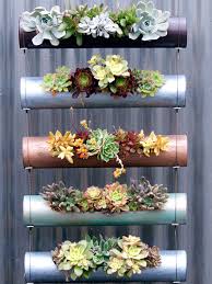 These planters can be attached in a series to. Vertical Garden Ideas Better Homes Gardens