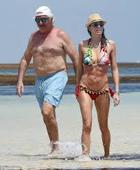 In 1991, with a quick and visionary move, briatore snatched young driver michael schumacher from the. Flavio Briatore 64 Kisses Wife Elisabetta 34 On Kenyan Beach Embellished Bikini Mermaid Fashion Celebrities Female